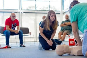 Ally Medical CPR Instructor Stephanie Moody teaching proper CPR techniques.